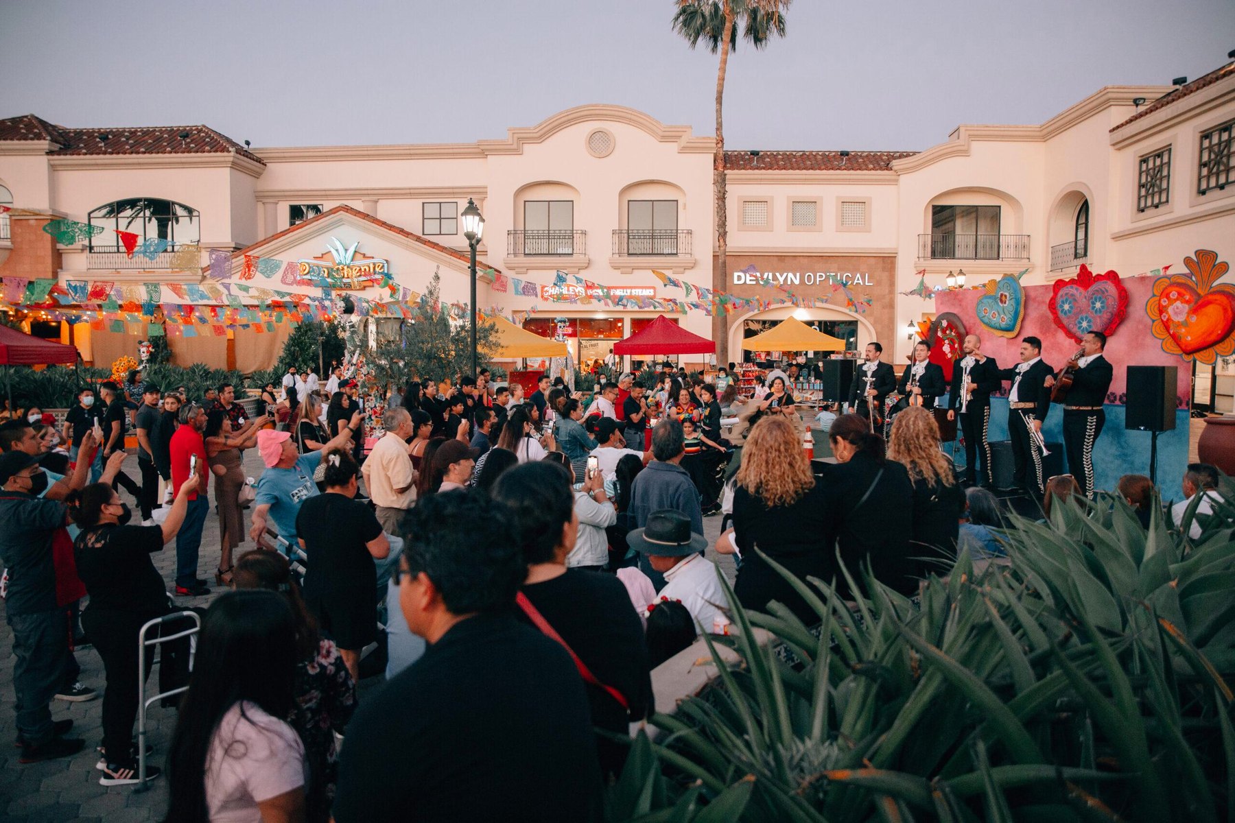 A community event drawing crowds at Plaza La Alameda